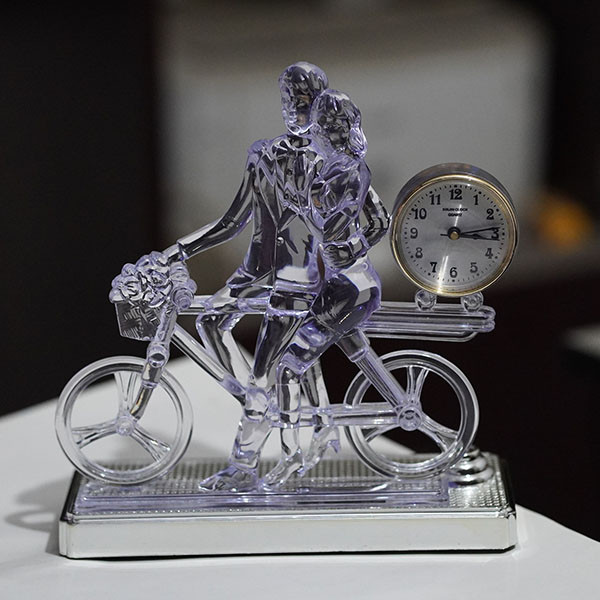 Bycycle Man with clock